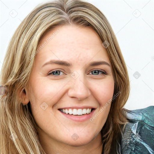 Joyful white young-adult female with long  brown hair and green eyes