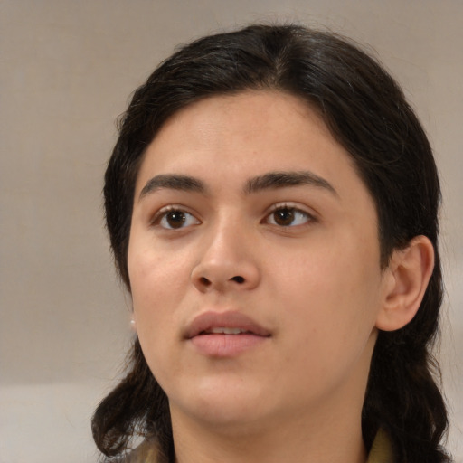 Neutral white young-adult female with medium  brown hair and brown eyes