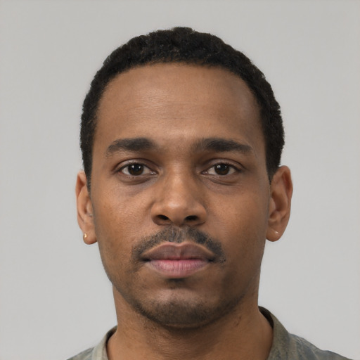 Neutral black young-adult male with short  black hair and brown eyes