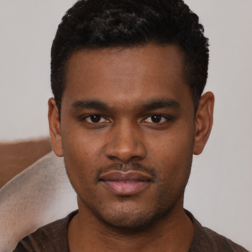 Neutral black young-adult male with short  brown hair and brown eyes
