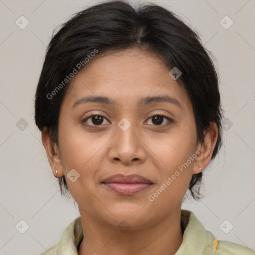 Joyful latino young-adult female with medium  brown hair and brown eyes