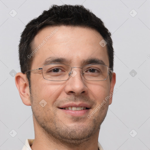 Joyful white adult male with short  brown hair and brown eyes