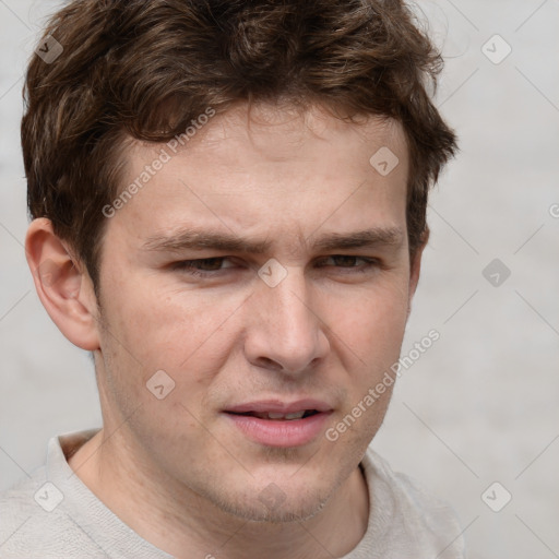 Joyful white adult male with short  brown hair and grey eyes