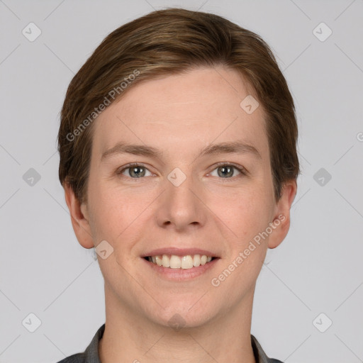 Joyful white young-adult female with short  brown hair and grey eyes