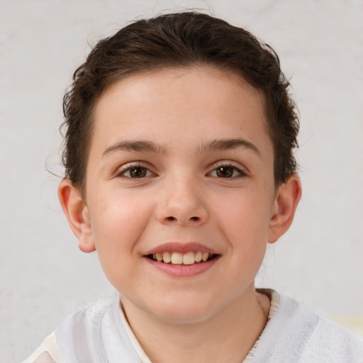 Joyful white child female with short  brown hair and brown eyes