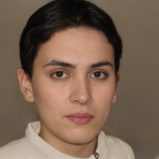 Neutral white young-adult female with short  brown hair and brown eyes