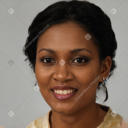 Joyful black young-adult female with medium  black hair and brown eyes
