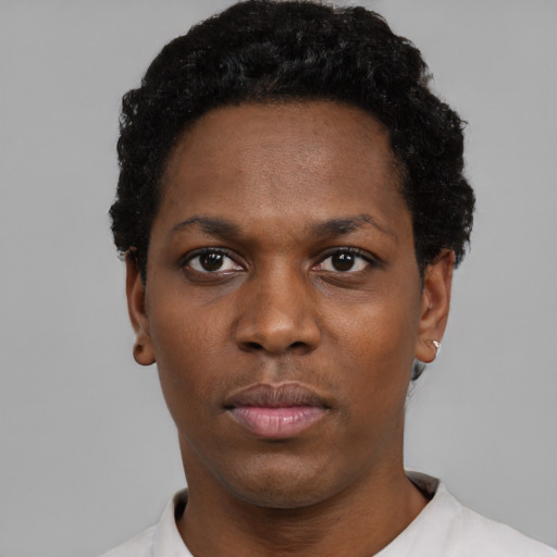 Neutral black young-adult female with short  black hair and brown eyes