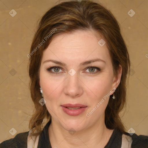 Joyful white young-adult female with medium  brown hair and green eyes