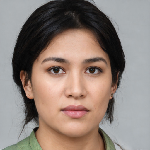 Neutral white young-adult female with medium  black hair and brown eyes