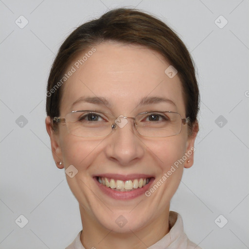 Joyful white adult female with short  brown hair and brown eyes