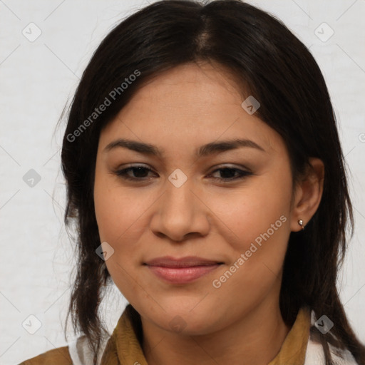 Joyful latino young-adult female with medium  brown hair and brown eyes