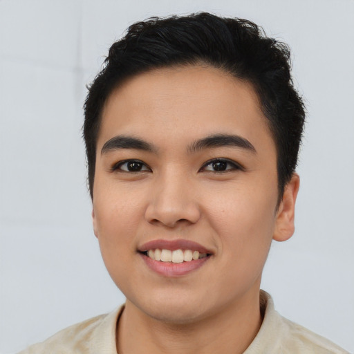 Joyful latino young-adult female with short  black hair and brown eyes
