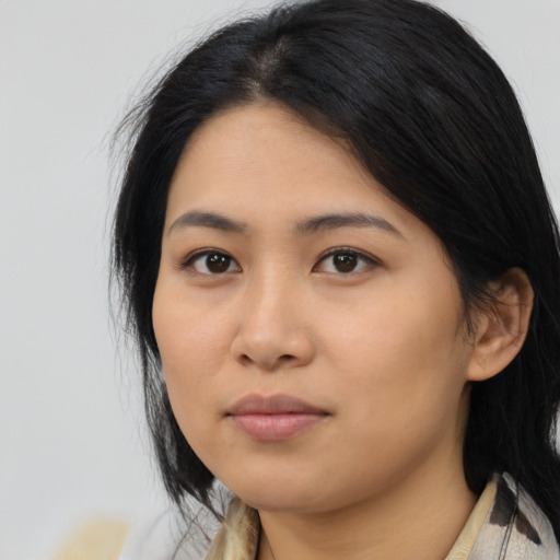 Neutral asian young-adult female with medium  black hair and brown eyes