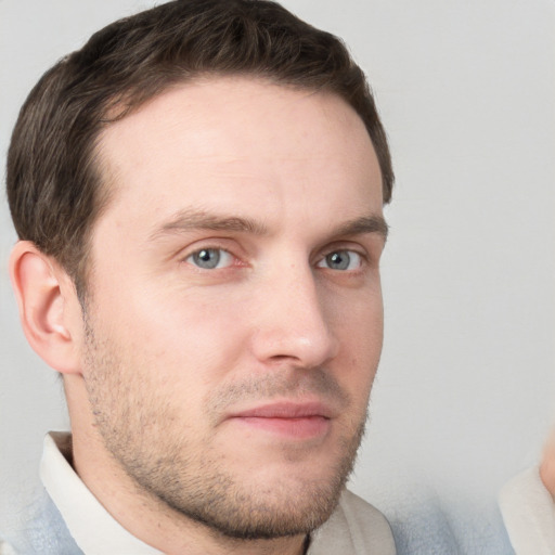 Neutral white young-adult male with short  brown hair and grey eyes