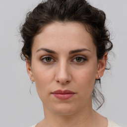 Neutral white young-adult female with short  brown hair and brown eyes