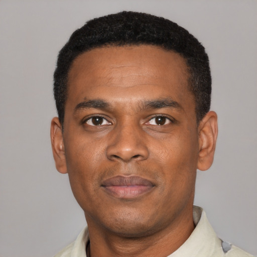 Neutral black young-adult male with short  black hair and brown eyes
