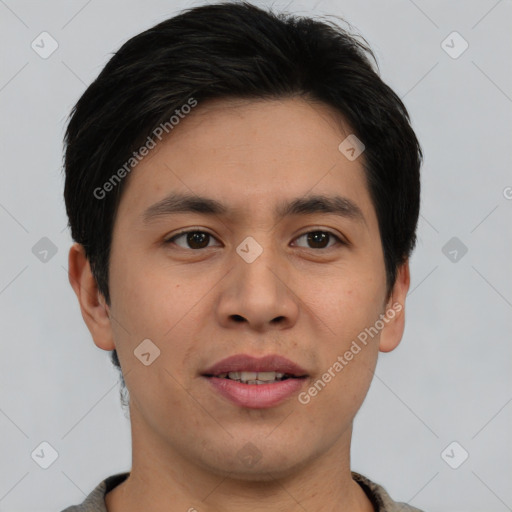 Joyful asian young-adult male with short  brown hair and brown eyes