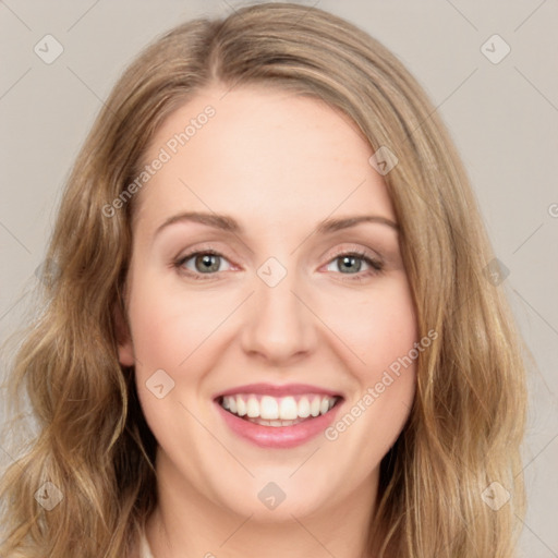 Joyful white young-adult female with long  brown hair and green eyes