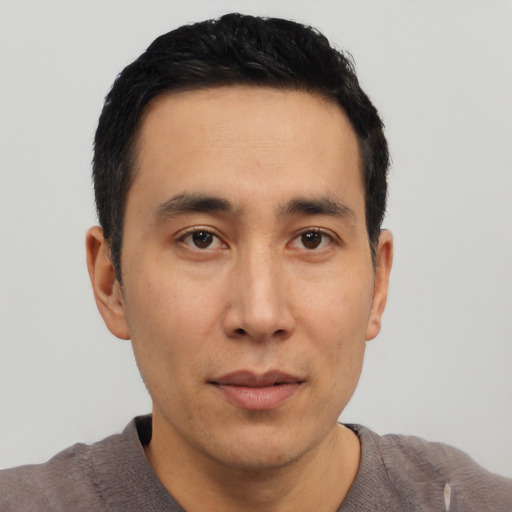 Neutral asian young-adult male with short  black hair and brown eyes