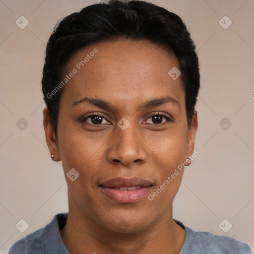 Joyful black young-adult female with short  black hair and brown eyes