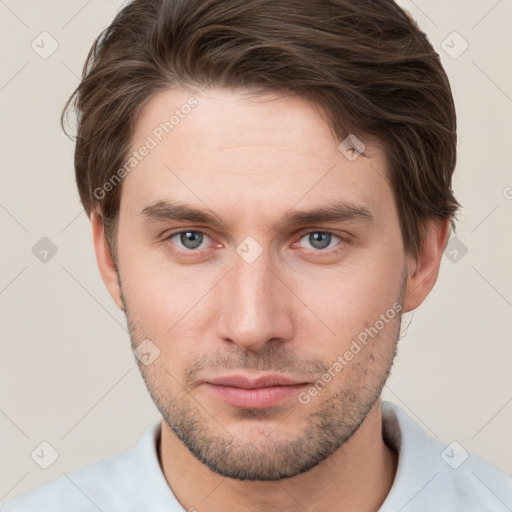 Neutral white young-adult male with short  brown hair and brown eyes