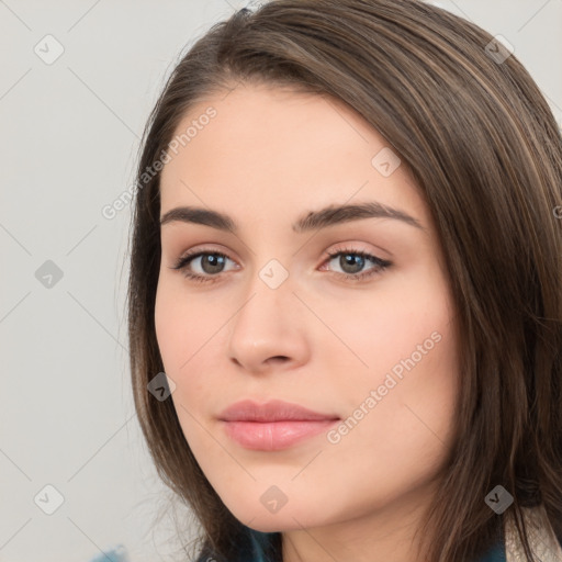 Neutral white young-adult female with long  brown hair and brown eyes