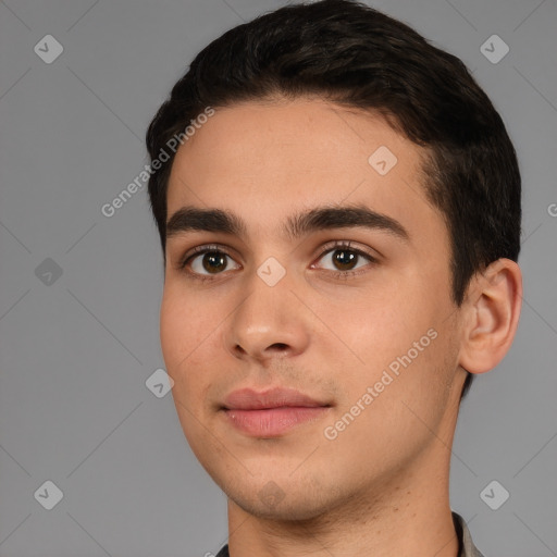 Joyful white young-adult male with short  black hair and brown eyes