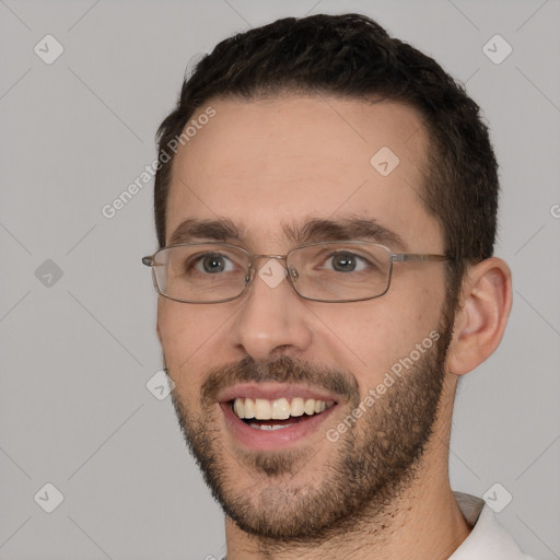 Joyful white young-adult male with short  brown hair and brown eyes