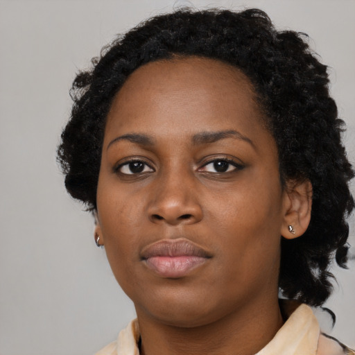 Neutral black young-adult female with long  black hair and brown eyes