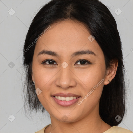 Joyful asian young-adult female with medium  brown hair and brown eyes