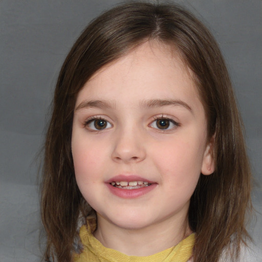 Joyful white child female with medium  brown hair and brown eyes