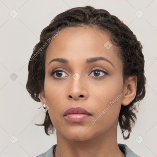 Neutral latino young-adult female with medium  brown hair and brown eyes