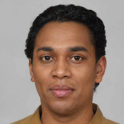 Neutral black young-adult male with short  black hair and brown eyes