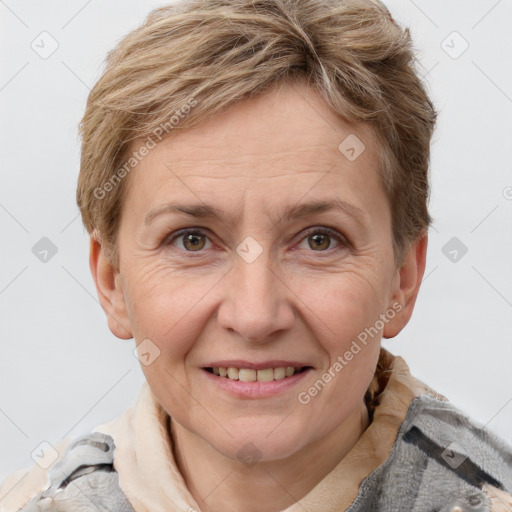 Joyful white adult female with short  brown hair and grey eyes