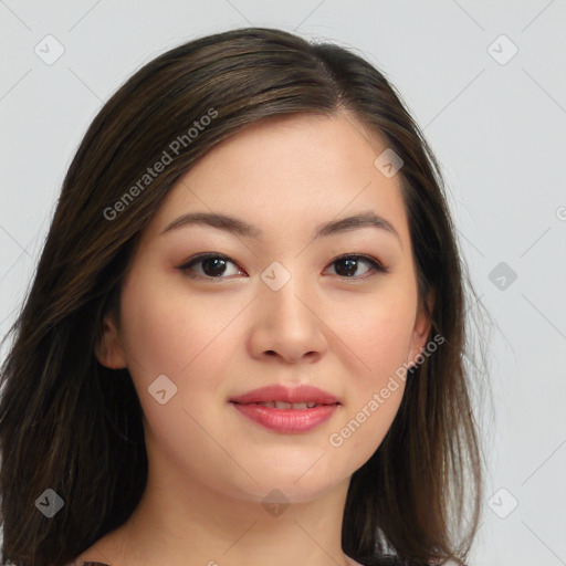 Joyful asian young-adult female with long  brown hair and brown eyes