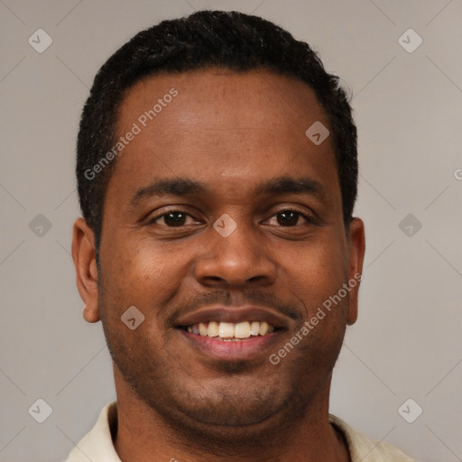 Joyful latino young-adult male with short  brown hair and brown eyes