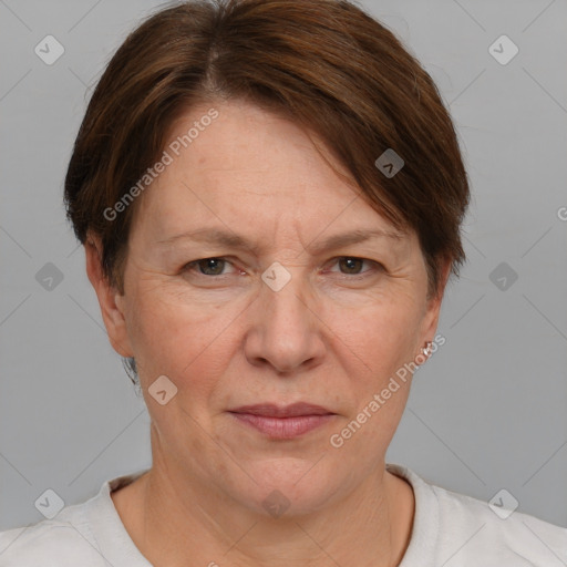 Joyful white adult female with short  brown hair and brown eyes