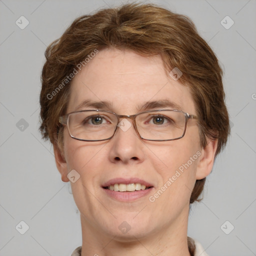 Joyful white adult female with short  brown hair and grey eyes