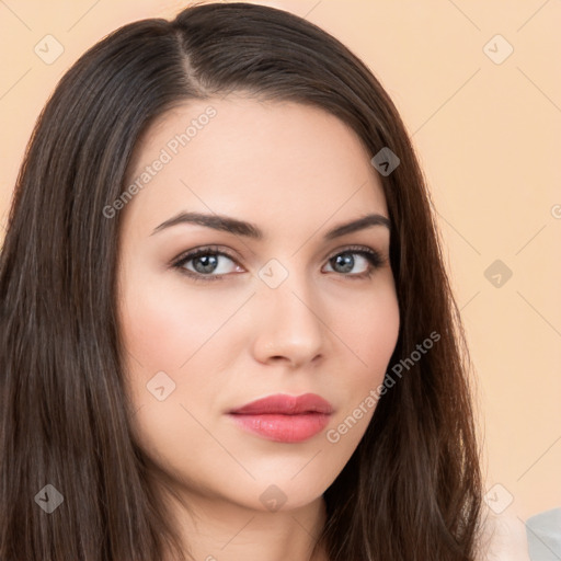 Neutral white young-adult female with long  brown hair and brown eyes