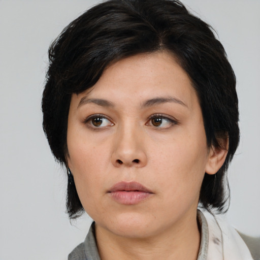 Neutral asian young-adult female with medium  black hair and brown eyes