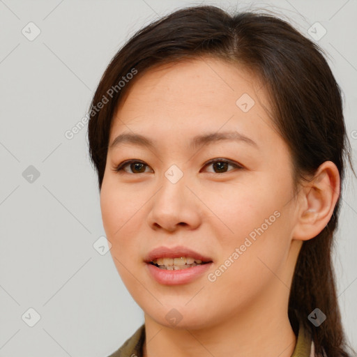 Joyful white young-adult female with long  brown hair and brown eyes