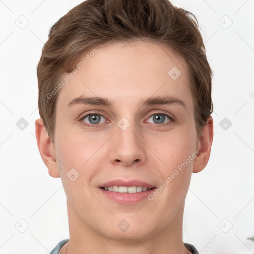 Joyful white young-adult female with short  brown hair and grey eyes