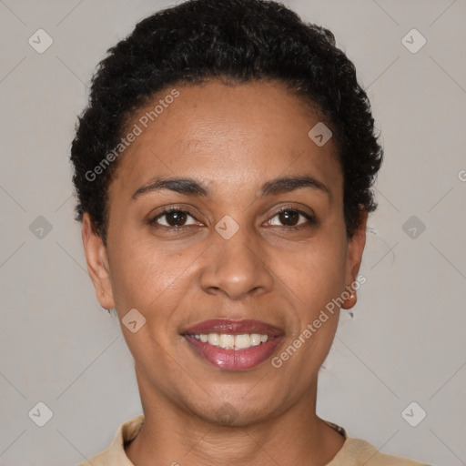 Joyful latino young-adult female with short  black hair and brown eyes