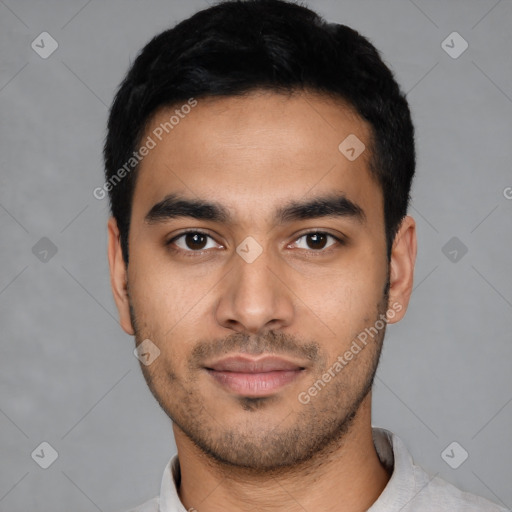 Neutral latino young-adult male with short  black hair and brown eyes