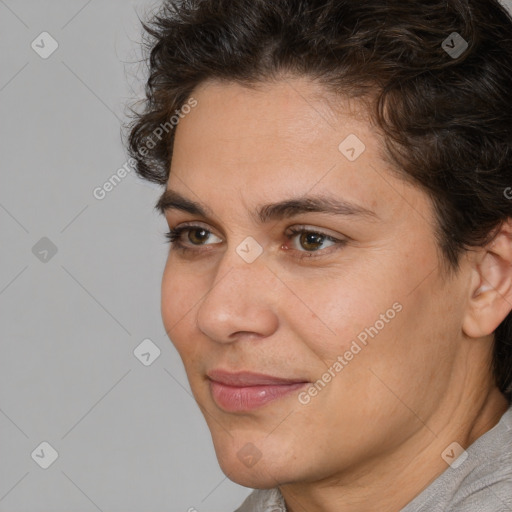 Joyful white adult female with short  brown hair and brown eyes