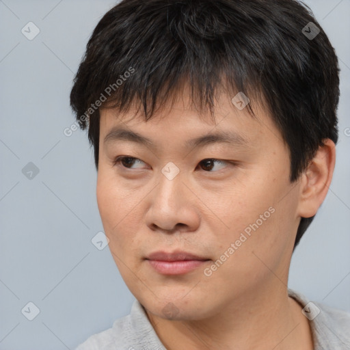 Neutral asian young-adult male with short  brown hair and brown eyes