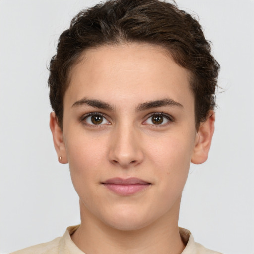 Neutral white young-adult female with short  brown hair and brown eyes