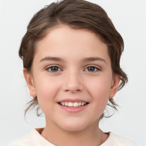 Joyful white child female with medium  brown hair and brown eyes