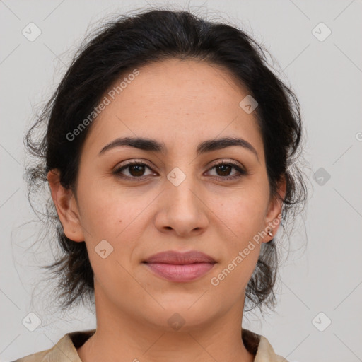 Joyful latino young-adult female with medium  brown hair and brown eyes